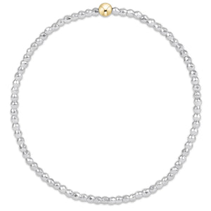 BRIGHT SILVER FACETED HEMATITE 2MM BEADED BRACELET AND WITH GOLD INSPIRE CHARM