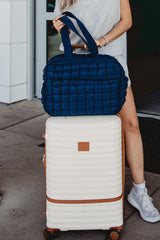 NAVY QUILTED DUFFEL WEEKENDER BAG W/ PASS-THRU SLIP