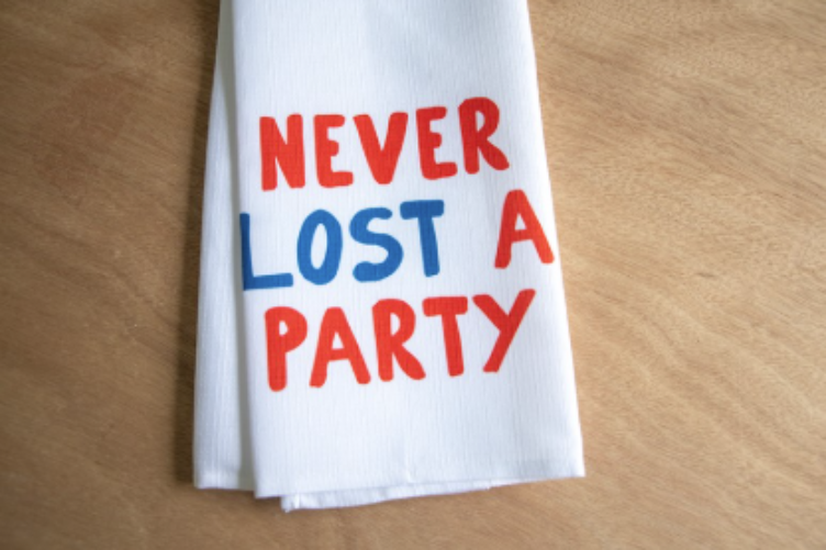 NEVER LOST A PARTY TEA TOWEL - Molly's! A Chic and Unique Boutique 